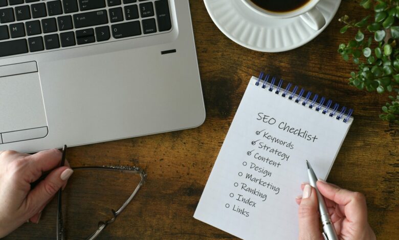 Female checking off SEO tool items on SEO checklist - search engine optimization