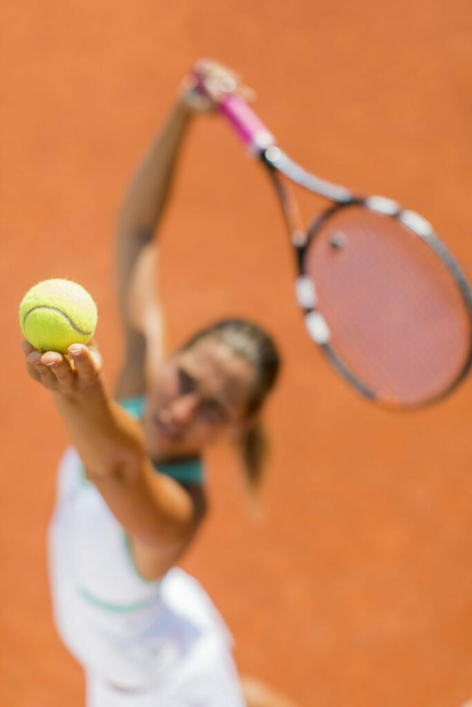 Woman showcasing tennis skills