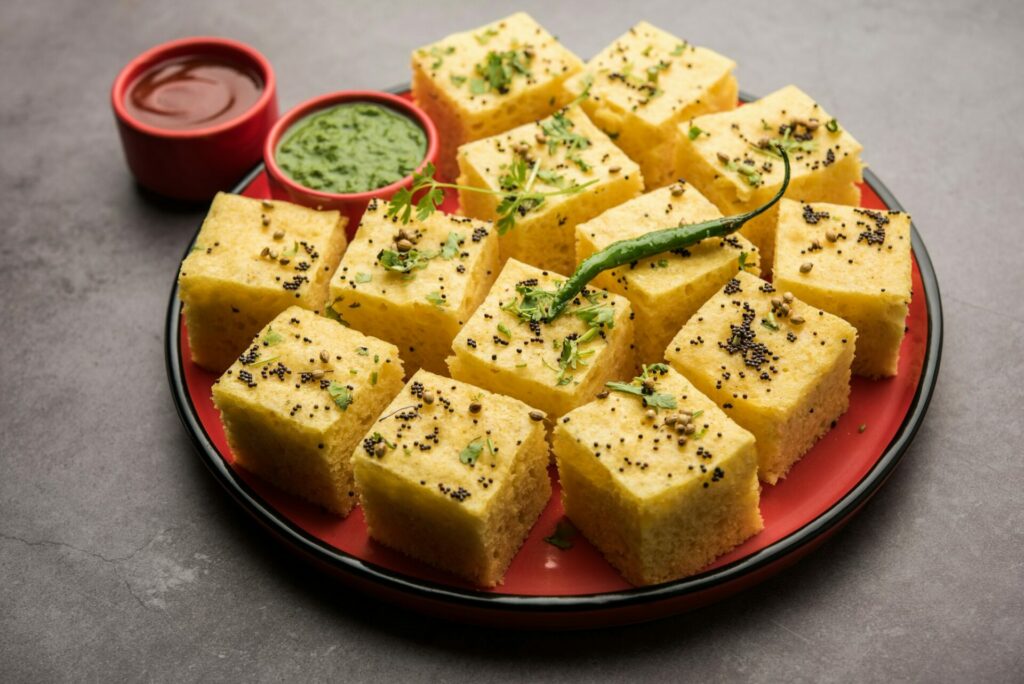 Gujarati Khaman Dhokla or Steamed Gram Flour Puffy Snack Cake